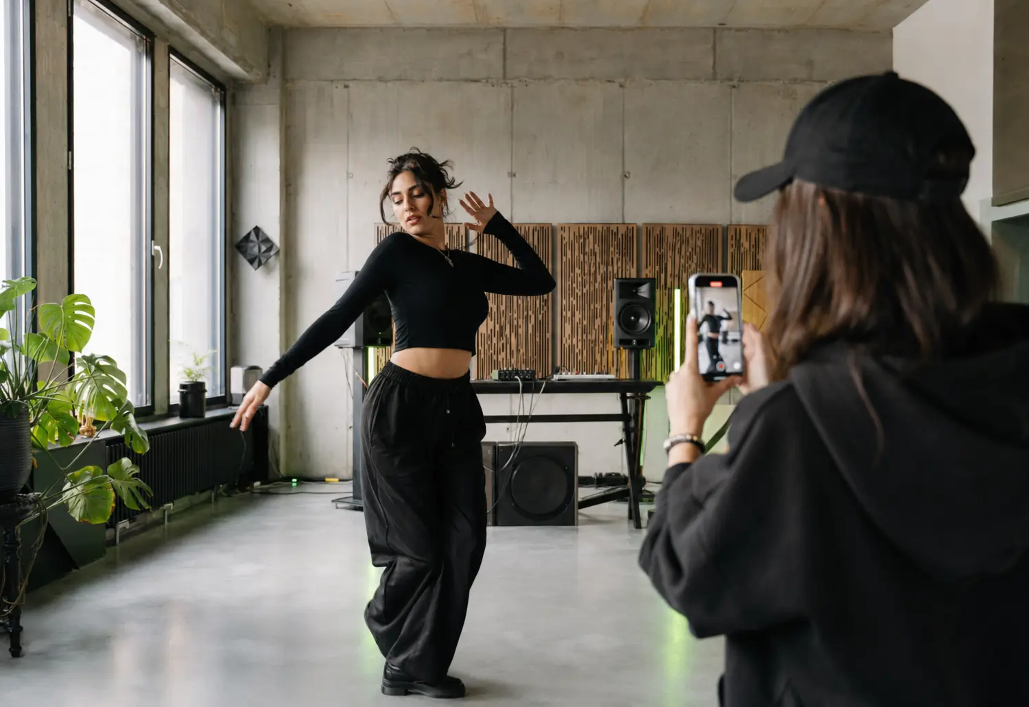 Electronic music influencer filming a dance performance for Instagram